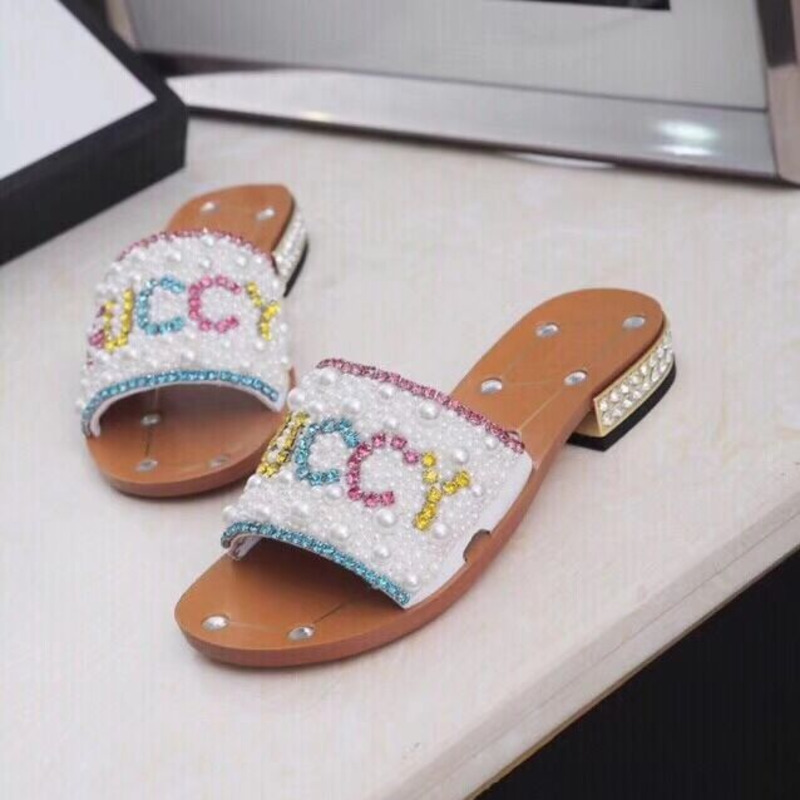 G*u*i slides with pearl