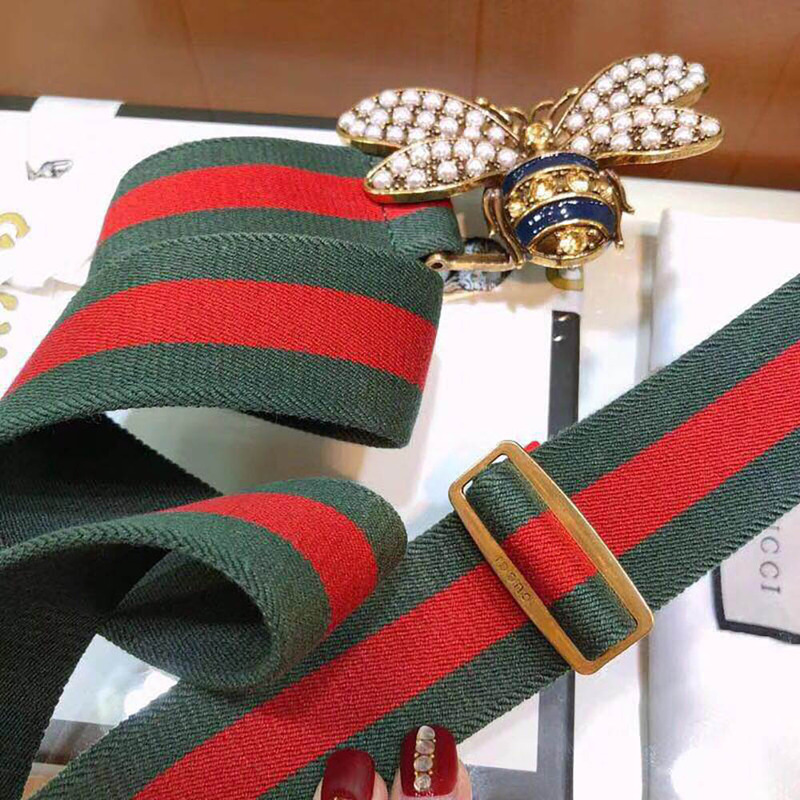 G*u*i web belt with bee( green and red web)