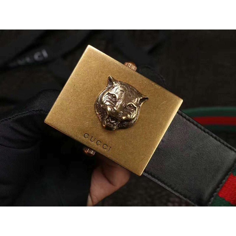 G*u*i canvas web green belt with feline head