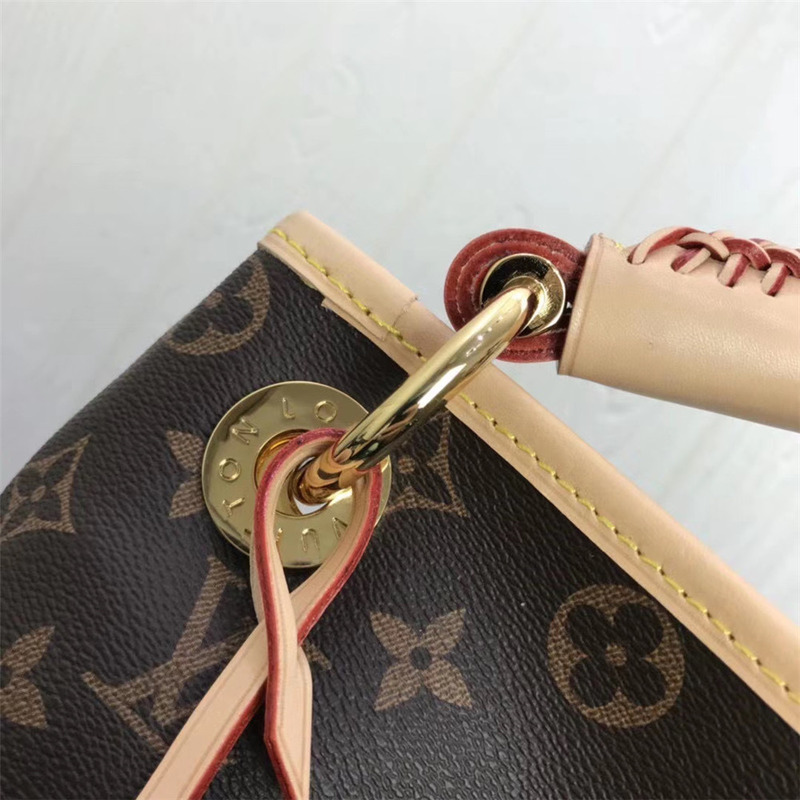 l**is V*t*n monogram handbag in brown