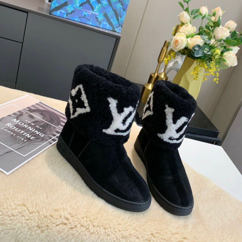 l**is V*t*n monogram black cotton boots