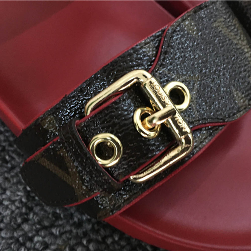 l**is V*t*n sandals red sole